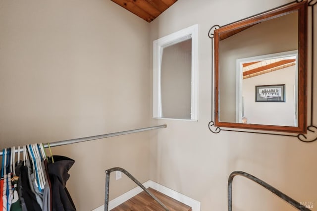 spacious closet featuring wood finished floors and lofted ceiling