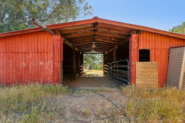 view of outdoor structure featuring an exterior structure and an outbuilding