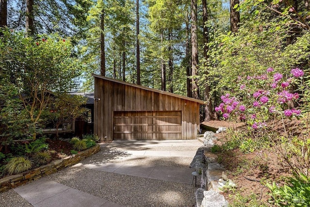 garage featuring driveway