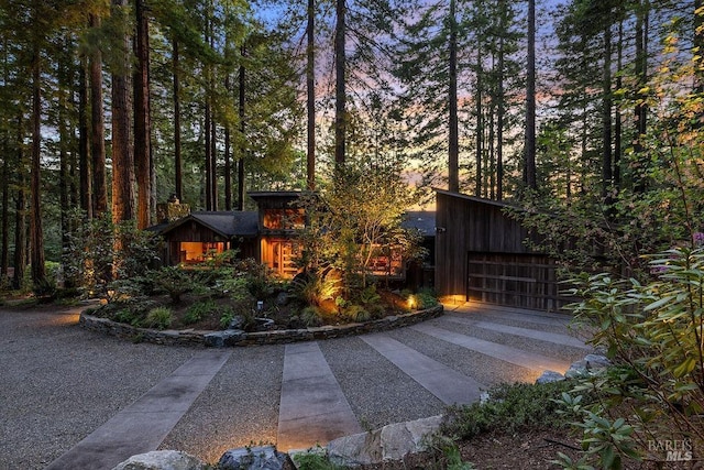 view of home's exterior featuring a garage and board and batten siding