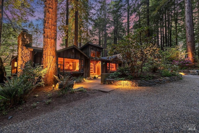 rustic home with a chimney