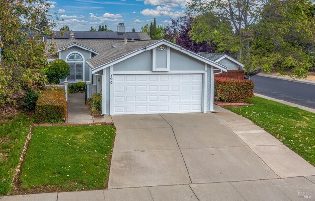 790 Morissette Way, Vacaville, CA 95687 - ranch-style home featuring roof with shingles, solar panels, a front lawn, a garage, and driveway