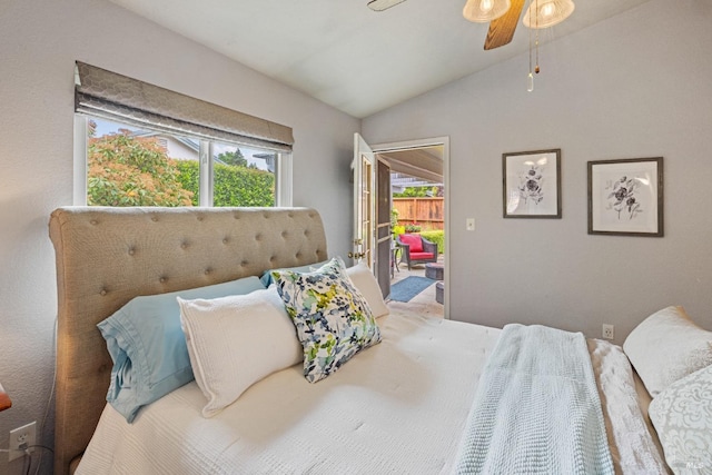 bedroom featuring ceiling fan and lofted ceiling