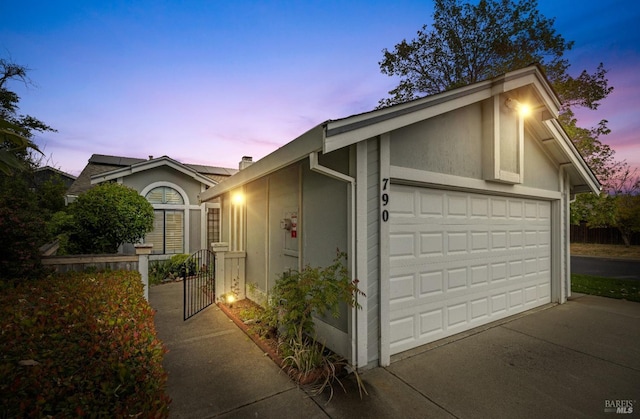 790 Morissette Way, Vacaville, CA 95687 - view of property exterior with concrete driveway, stucco siding, and an attached garage
