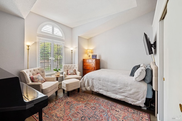 bedroom featuring wood finished floors