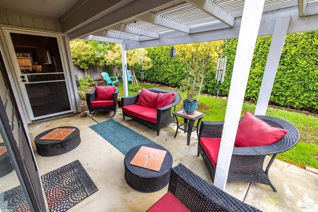 view of patio / terrace featuring fence, a pergola, and an outdoor living space