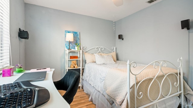 bedroom featuring light wood finished floors