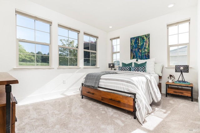 carpeted bedroom with baseboards and recessed lighting