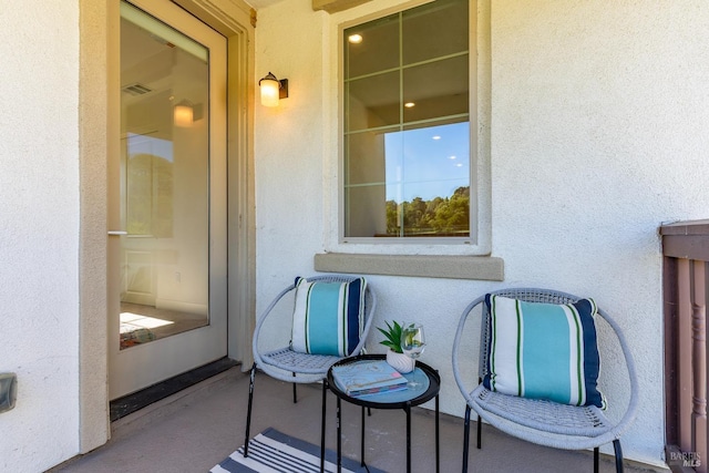 balcony featuring visible vents
