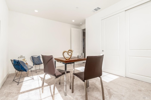carpeted dining room with recessed lighting and visible vents