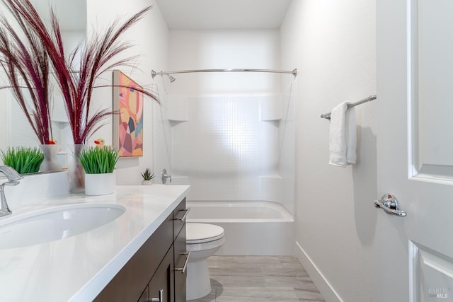 full bath featuring toilet, washtub / shower combination, and vanity