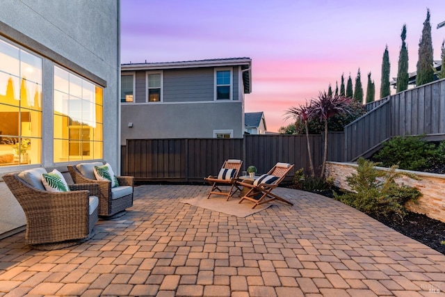 view of patio / terrace featuring fence