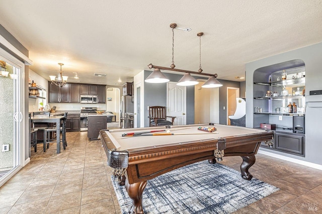 playroom with billiards, visible vents, baseboards, and a notable chandelier