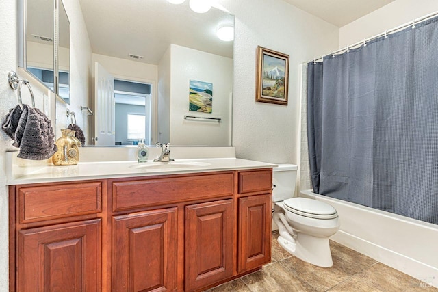 full bath featuring shower / bath combination with curtain, visible vents, tile patterned flooring, vanity, and toilet