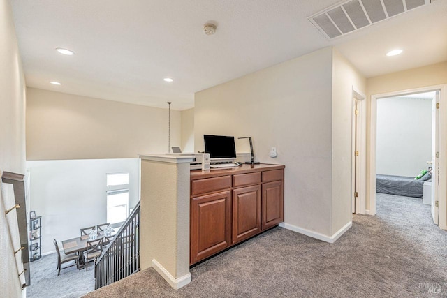 interior space with visible vents, recessed lighting, baseboards, and light carpet