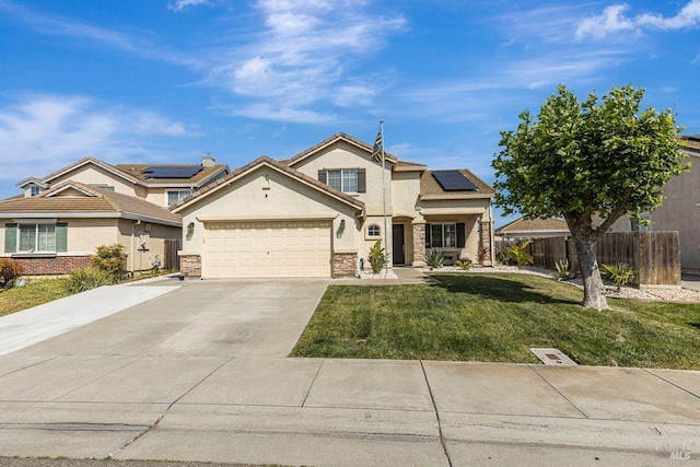 traditional home with fence, stucco siding, driveway, and a front yard