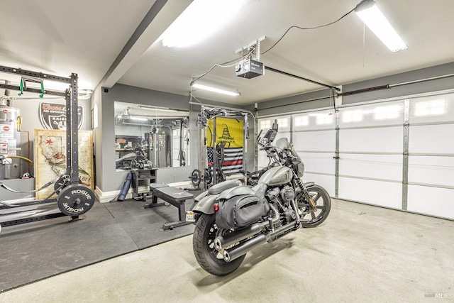garage featuring a garage door opener and strapped water heater