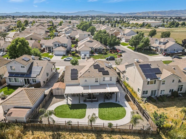 bird's eye view with a residential view and a mountain view