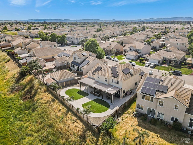 bird's eye view with a residential view and a mountain view