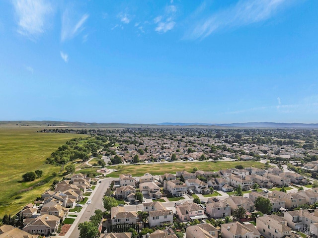 aerial view with a mountain view and a residential view