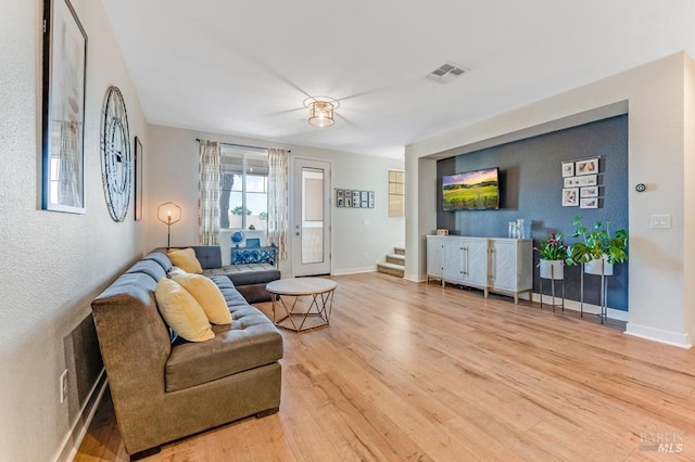 218 Johnson St, Windsor, CA 95492 - living area featuring wood finished floors, stairs, and baseboards