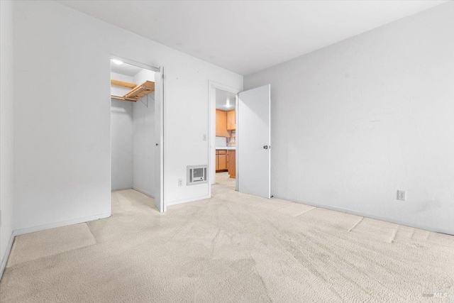 105 Virginia Ave Unit 2, Sebastopol, CA 95472 - unfurnished bedroom with light carpet, a walk in closet, a closet, and baseboards