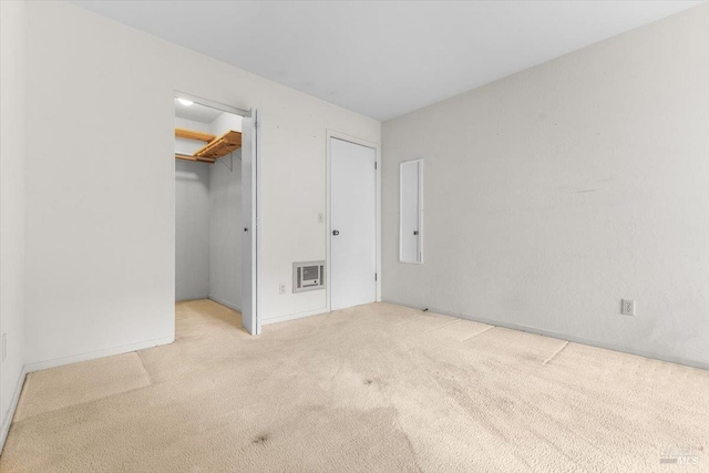 105 Virginia Ave Unit 2, Sebastopol, CA 95472 - unfurnished bedroom with carpet, heating unit, a spacious closet, and a closet