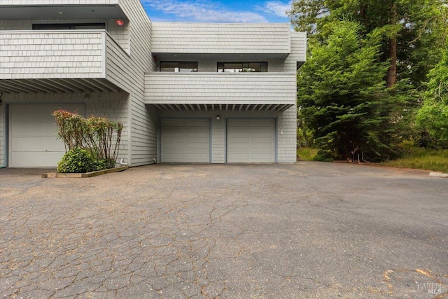 105 Virginia Ave Unit 2, Sebastopol, CA 95472 - view of front of property featuring a balcony, an attached garage, and driveway