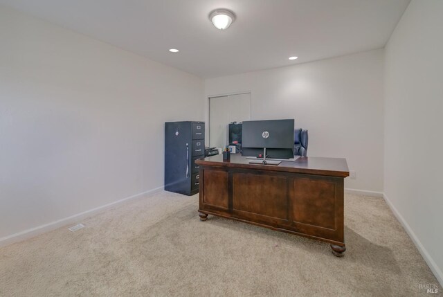 office featuring baseboards, recessed lighting, and light carpet