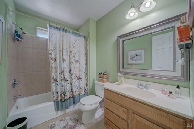 bathroom featuring tile patterned flooring, shower / bathtub combination with curtain, toilet, and vanity