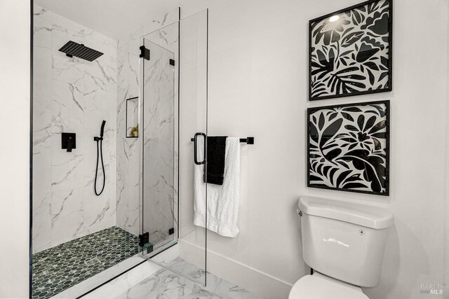 full bathroom with toilet, baseboards, a marble finish shower, and marble finish floor