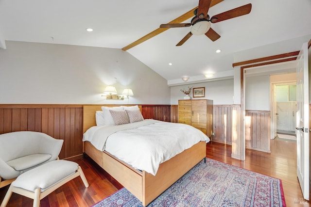 bedroom with ceiling fan, lofted ceiling with beams, wood walls, a wainscoted wall, and wood finished floors