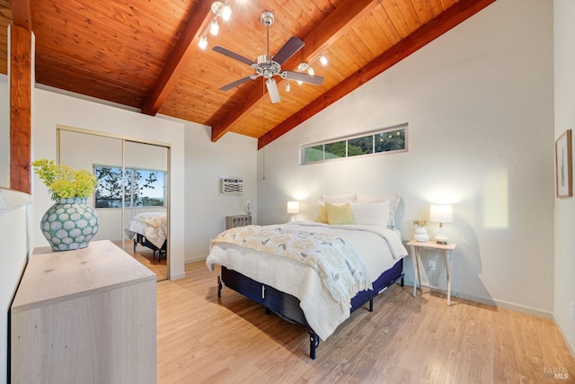 bedroom featuring baseboards, beam ceiling, wooden ceiling, and light wood-type flooring