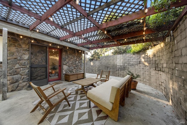 view of patio / terrace featuring a fenced backyard and a pergola