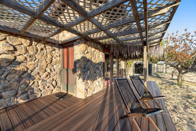 wooden terrace featuring a pergola