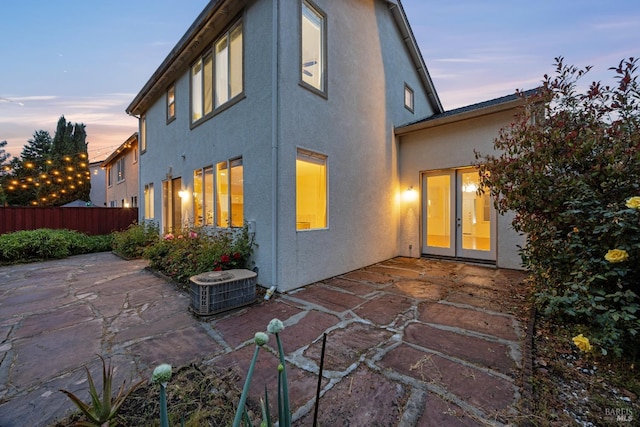2916 Park Meadow Dr, Santa Rosa, CA 95407 - rear view of house with central air condition unit, a patio, fence, and stucco siding