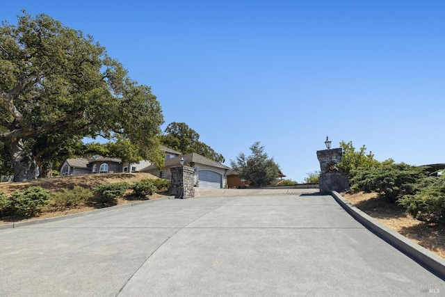 9 Canyon Ct, Petaluma, CA 94952 - view of road with street lights, driveway, and curbs