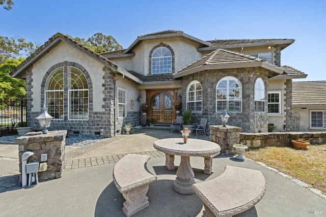 9 Canyon Ct, Petaluma, CA 94952 - exterior space featuring french doors, stucco siding, a patio area, and stone siding