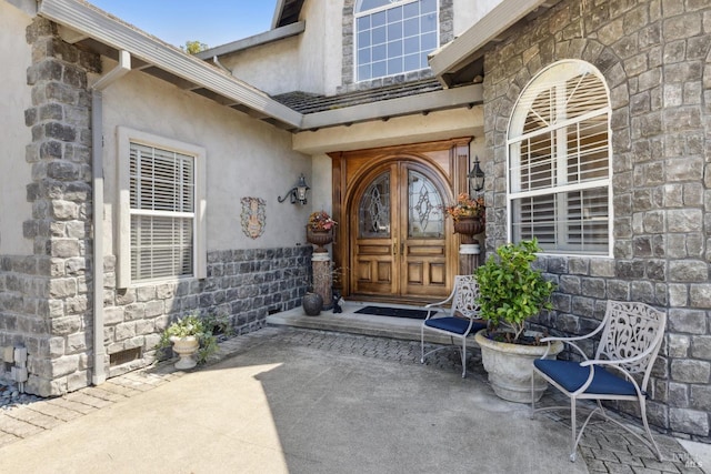 9 Canyon Ct, Petaluma, CA 94952 - doorway to property with stone siding and stucco siding