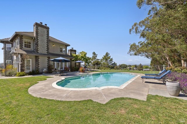 9 Canyon Ct, Petaluma, CA 94952 - view of swimming pool featuring a lawn, fence, a fenced in pool, and a patio area