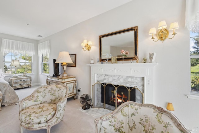9 Canyon Ct, Petaluma, CA 94952 - living area featuring a high end fireplace, an inviting chandelier, and carpet