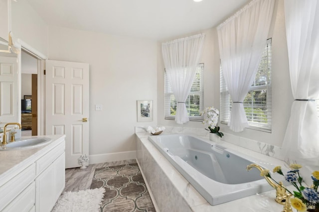 9 Canyon Ct, Petaluma, CA 94952 - full bathroom with vanity, baseboards, and a tub with jets