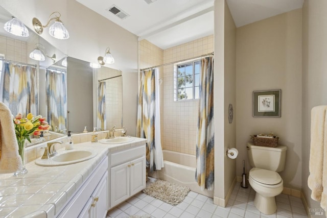 9 Canyon Ct, Petaluma, CA 94952 - bathroom featuring toilet, visible vents, a sink, and tile patterned flooring