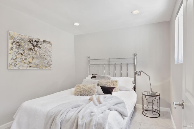 bedroom featuring recessed lighting, baseboards, and light tile patterned floors