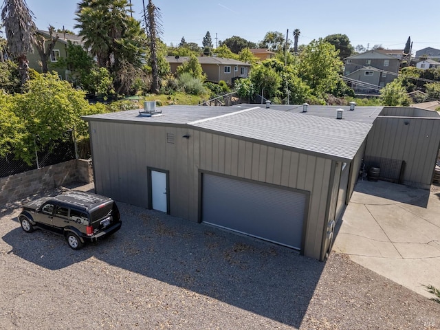 detached garage with a residential view