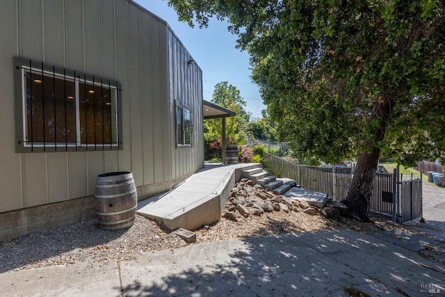 view of side of property with fence