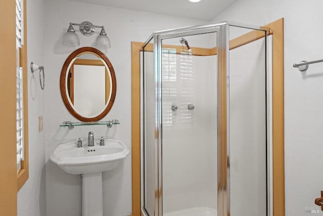 full bathroom with a shower stall