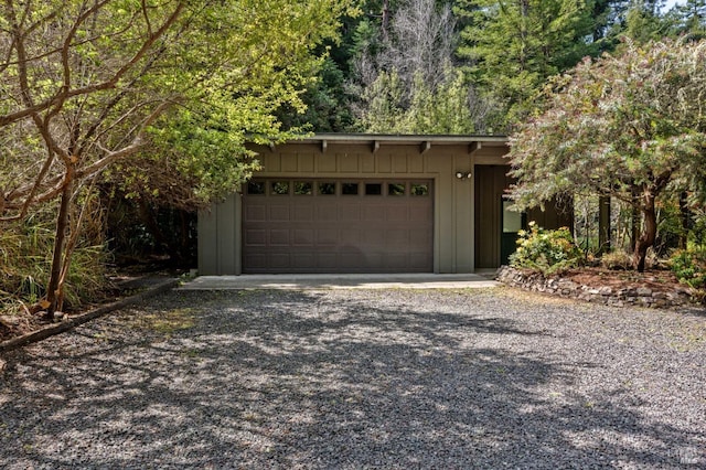 garage featuring driveway