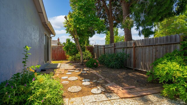 view of yard featuring a fenced backyard