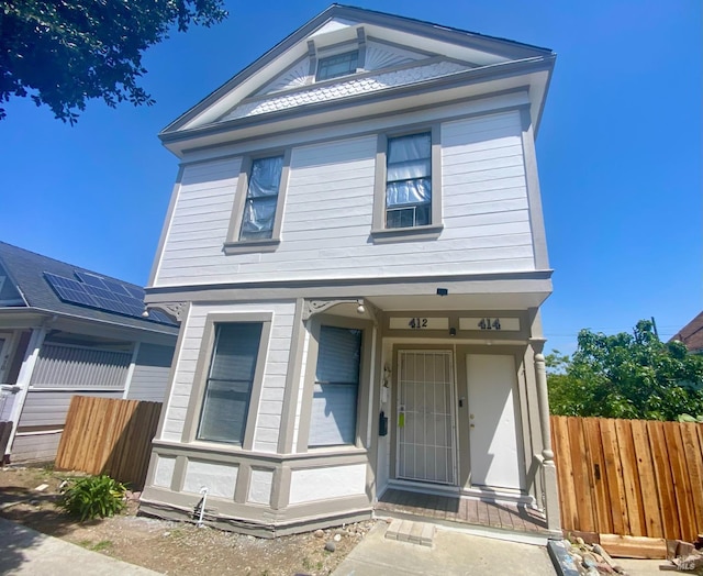 view of front of home with fence